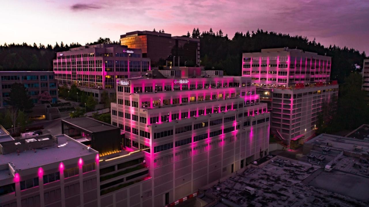T-Mobile office building at dusk with pink exterior lighting
