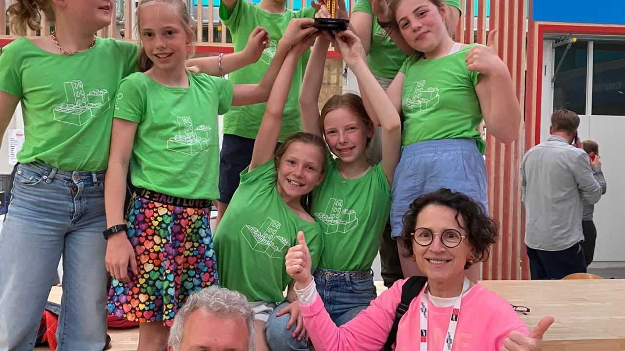 group photo with trophy