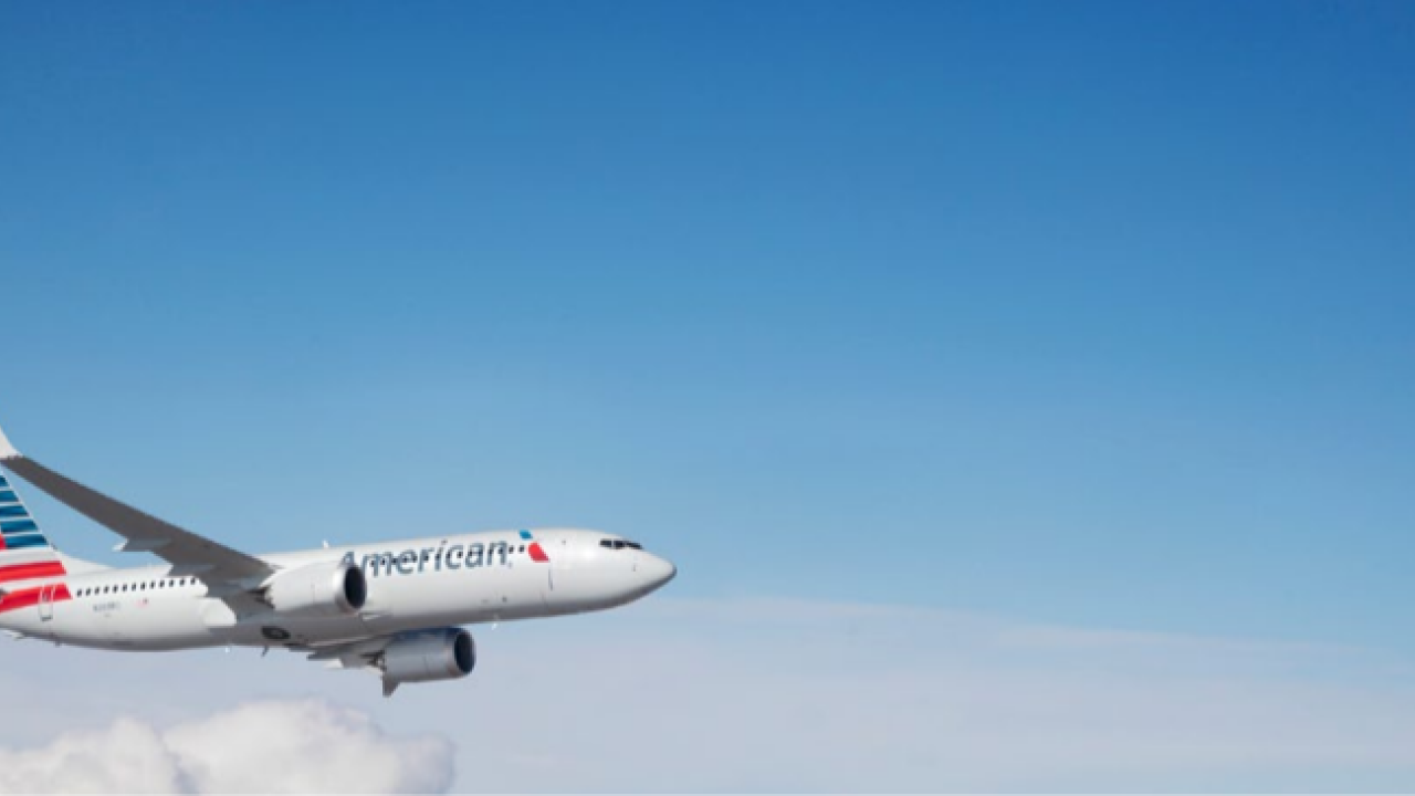 plane in flight above the clouds