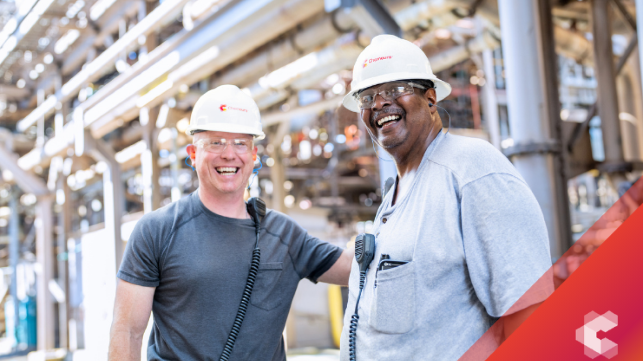 people wearing helmets smiling together