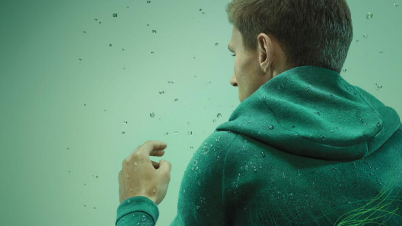 Person running in the rain in sweatshirt