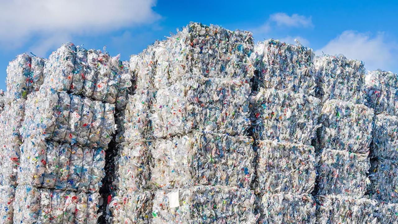 Stacks of bailed plastics for recycling.