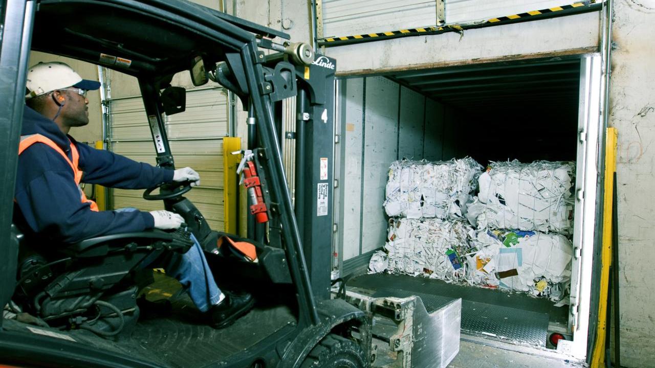 A person using a forklift 