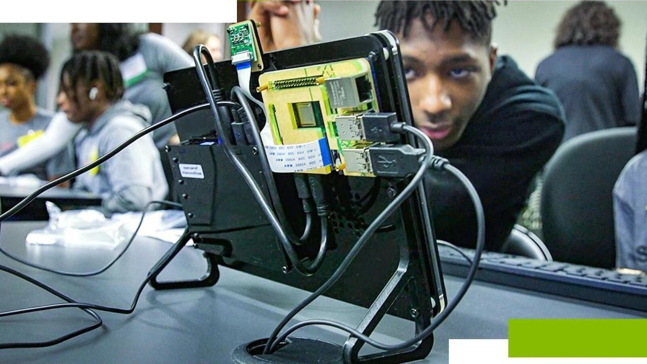 Student looking at a raspberry pi display