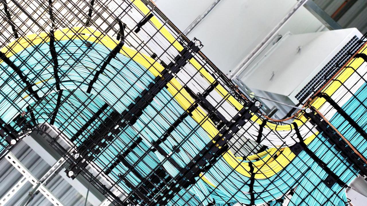 many rows of neatly aligned cables.