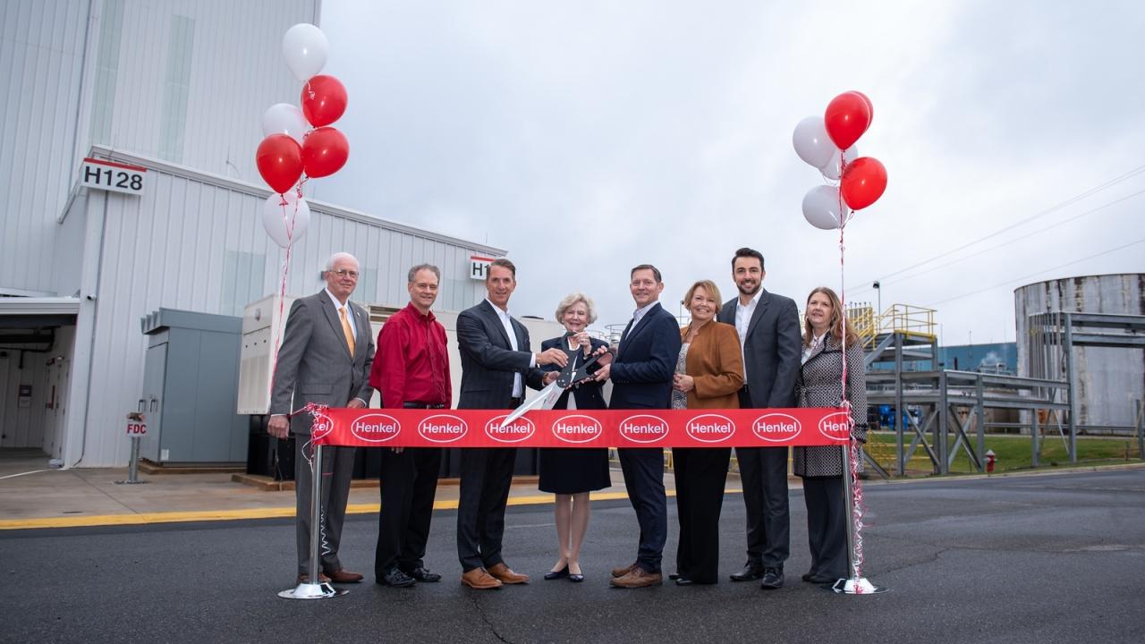 Group of people at ribbon cutting