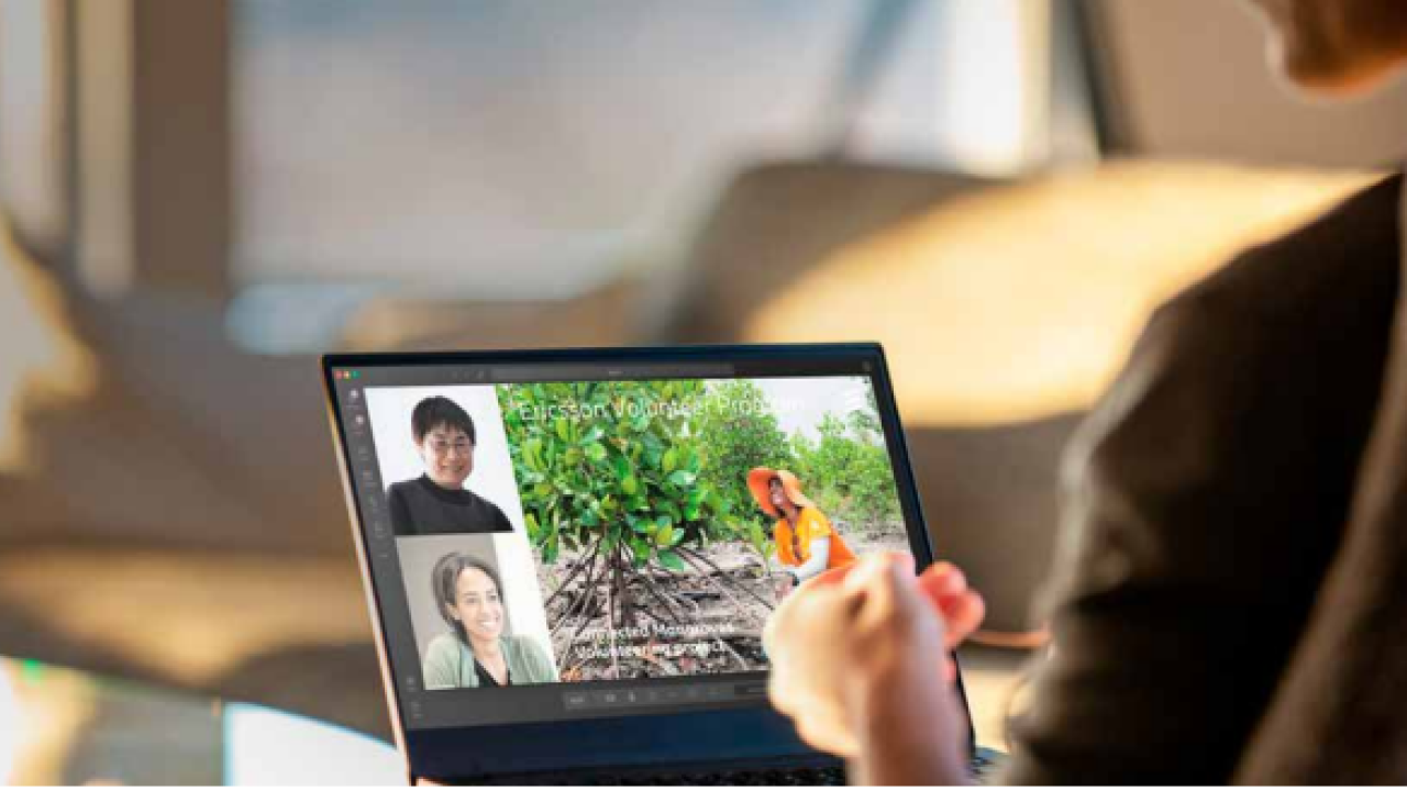 People in a meeting on a laptop screen