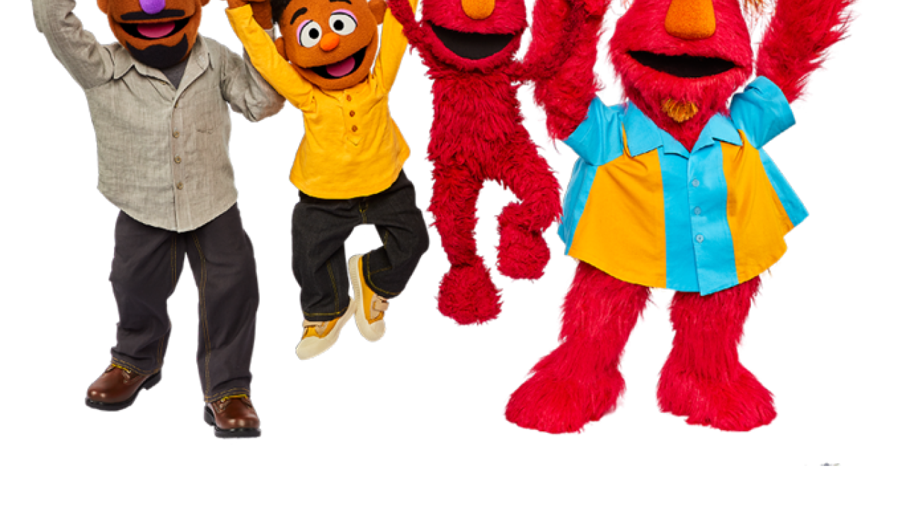 Four Sesame street puppets holding hands and jumping, Sesame Street logo in the bottom corner