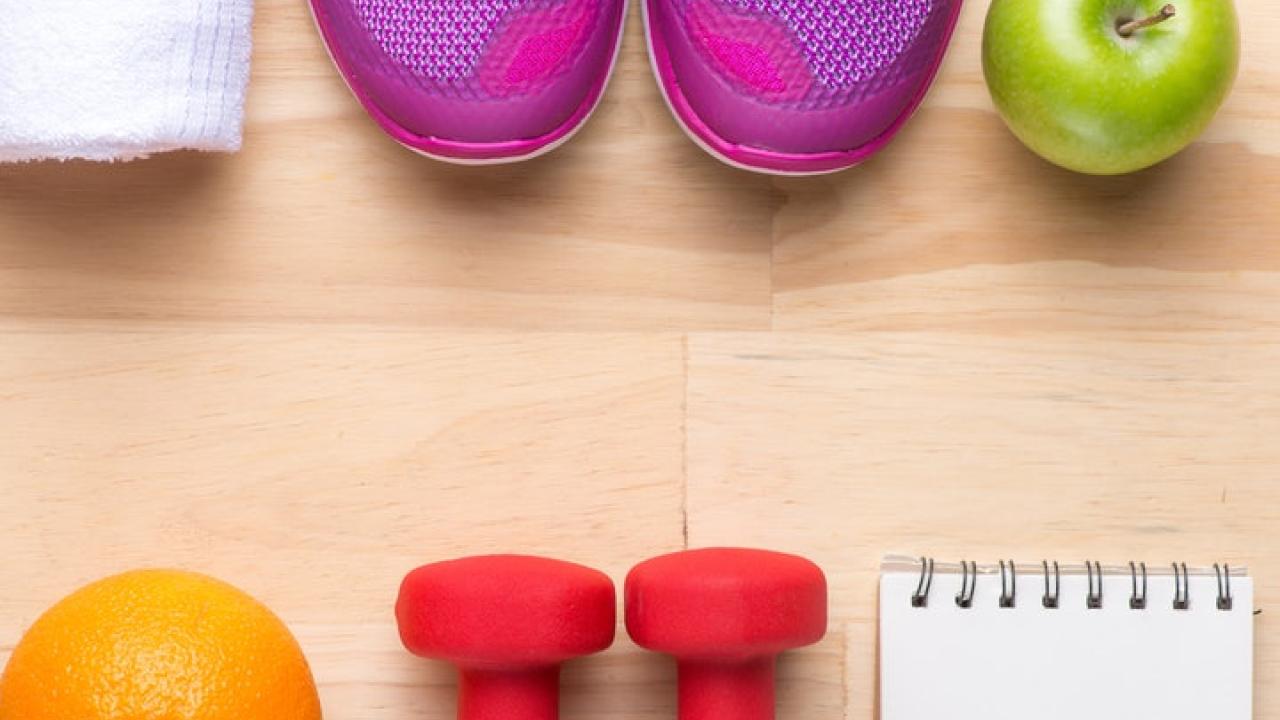 Health and fitness items lined up on a floor