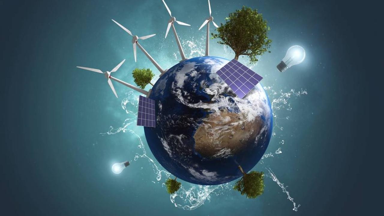 Globe with trees, windmills and solar panels. 