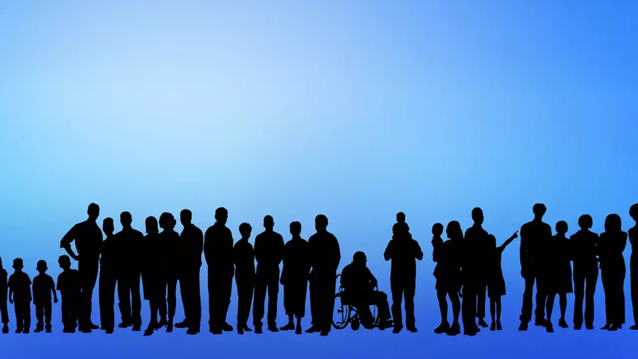 silhouettes of people on blue background