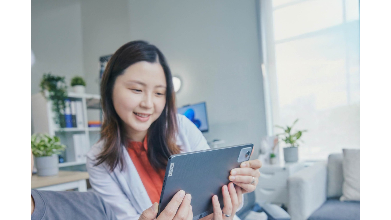 people looking at a tablet