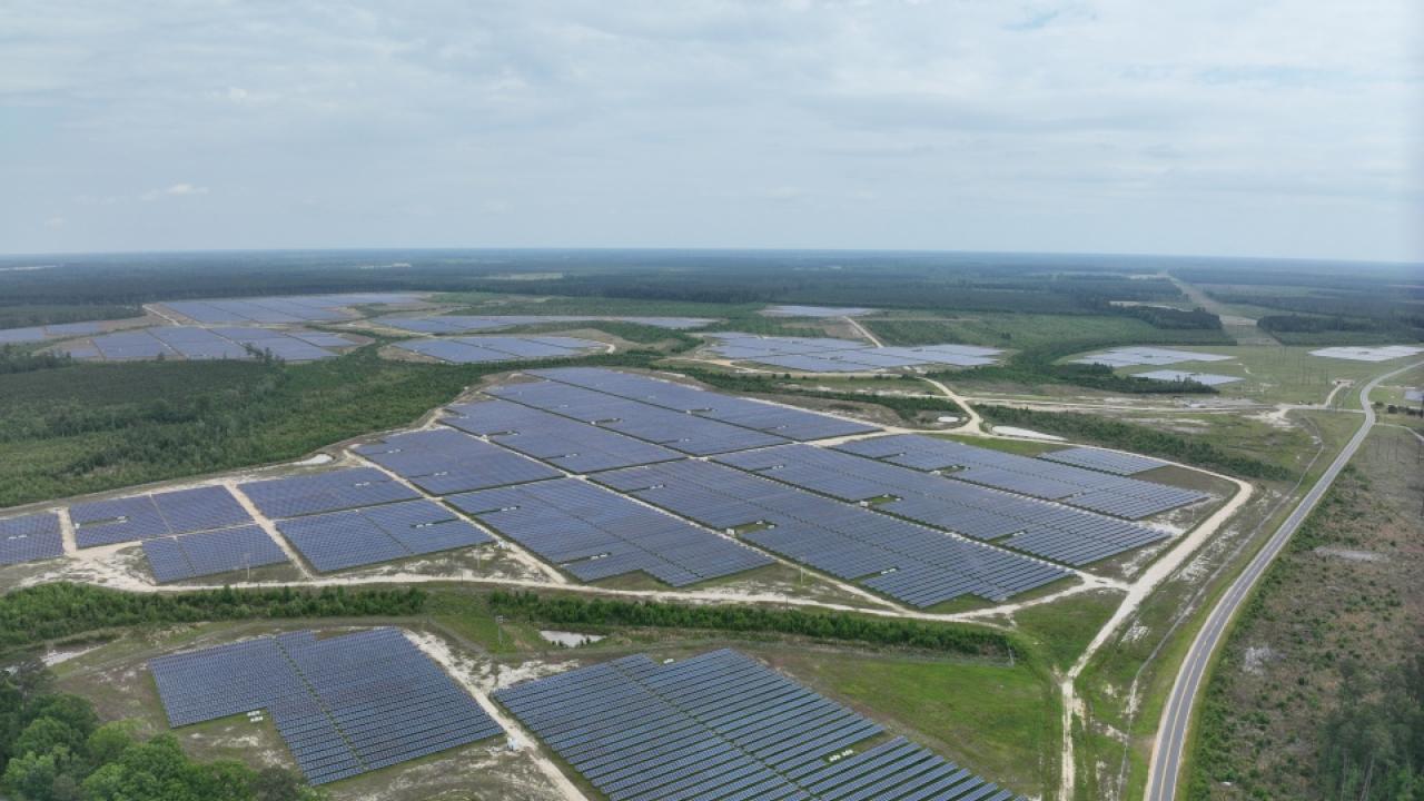 Aerial view of large fields of solar panels