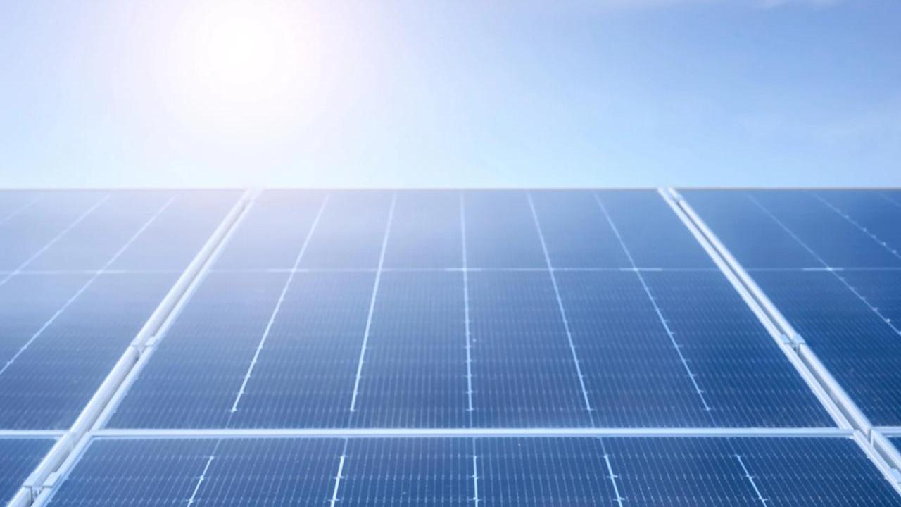 Looking towards the sky, a close up of solar panels.