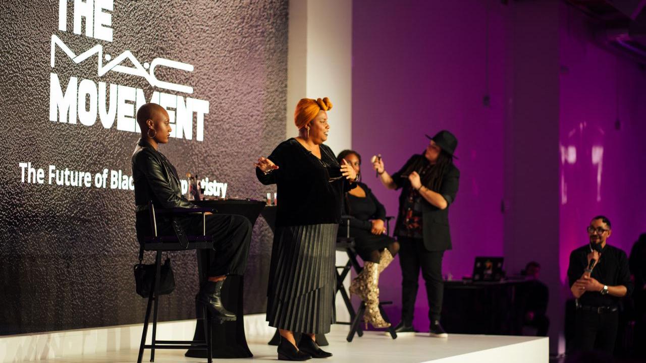 people presenting on stage