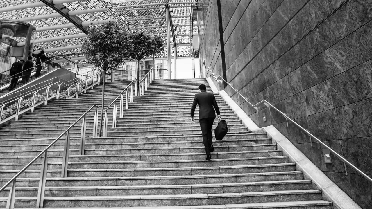 person walking up stairs