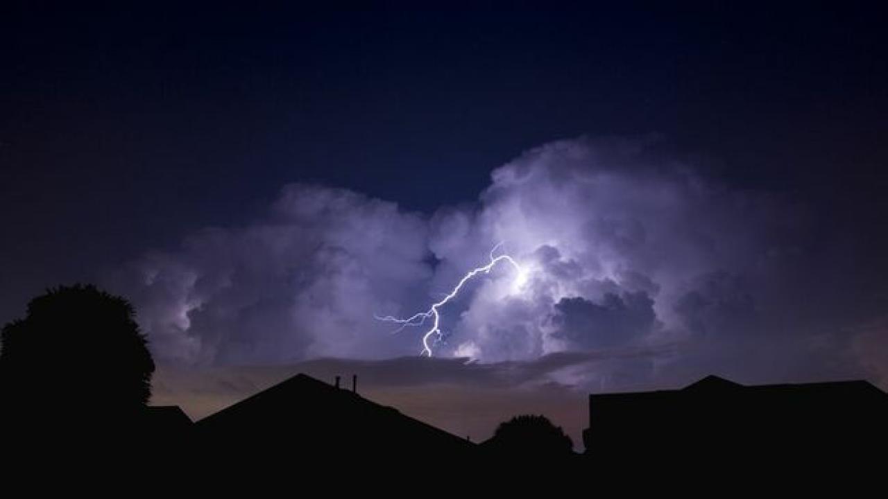 A thunderstorm over a residential area.
