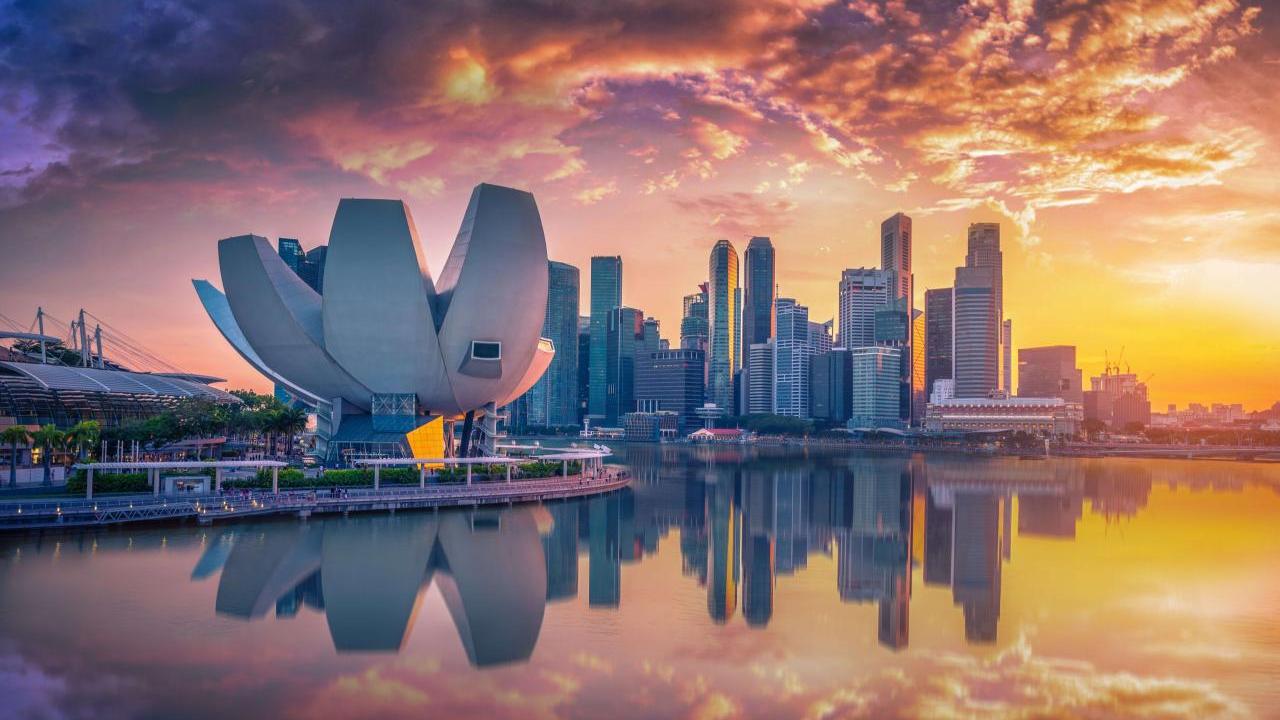 sunset behind buildings