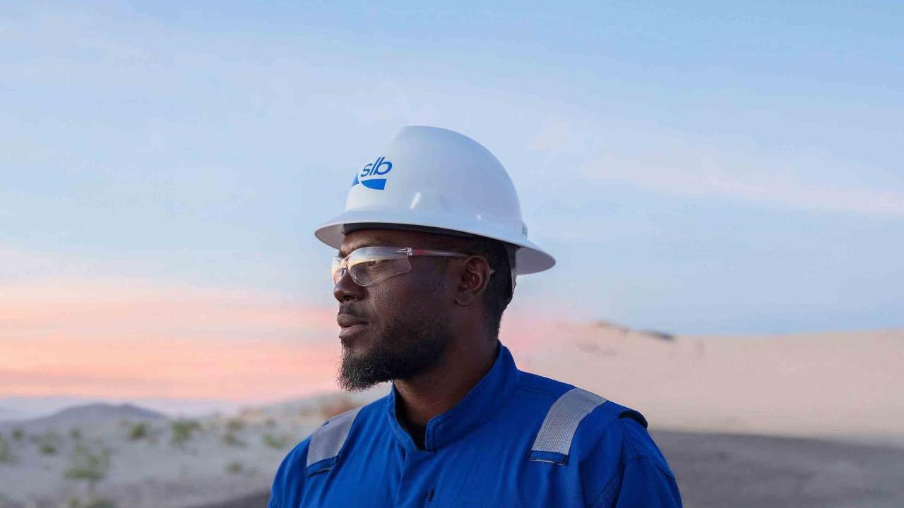 person with a helmet on looking at the landscape