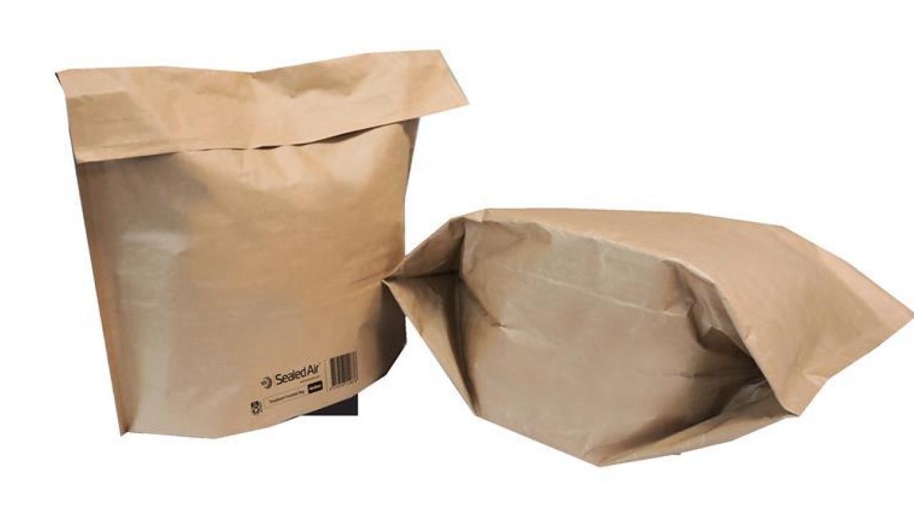 Two brown bags with the SEE logo on the bottom.