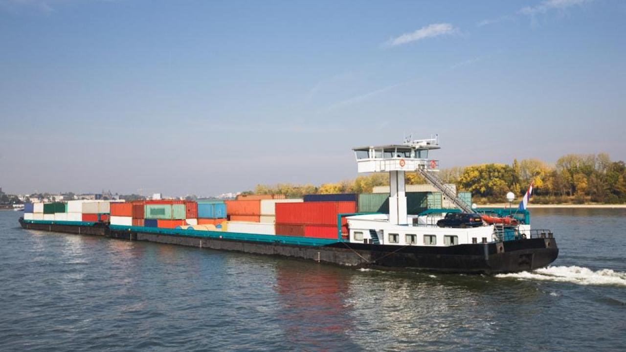 Barge with containers on the water