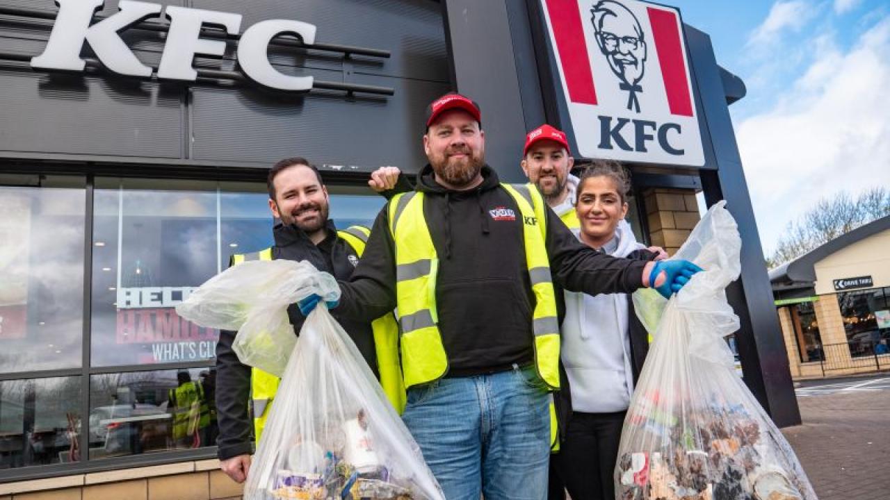 4 volunteers outside KFC