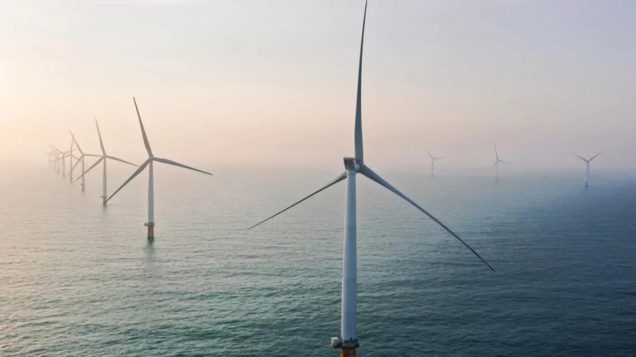 Offshore wind turbines in the fog.