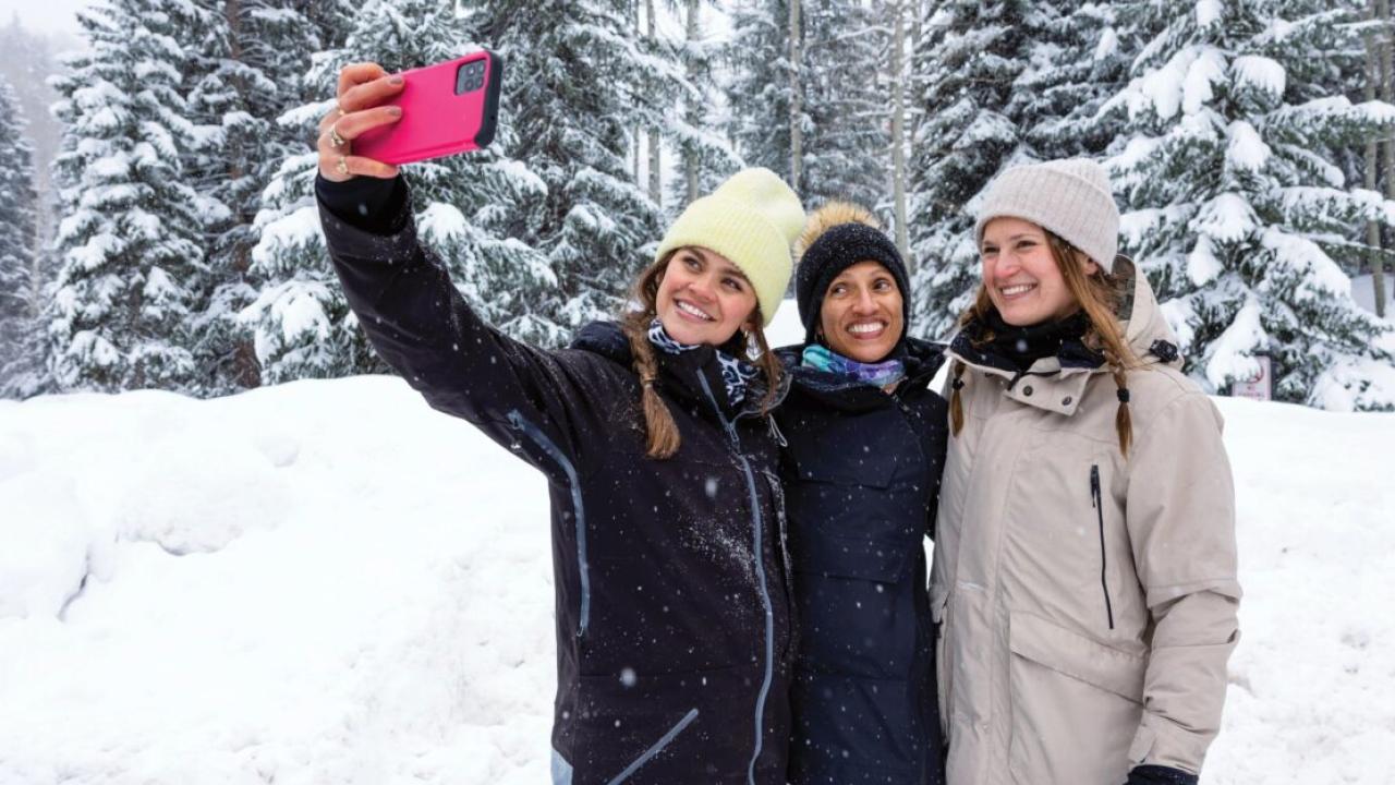 3 women taking a selfie in the snow