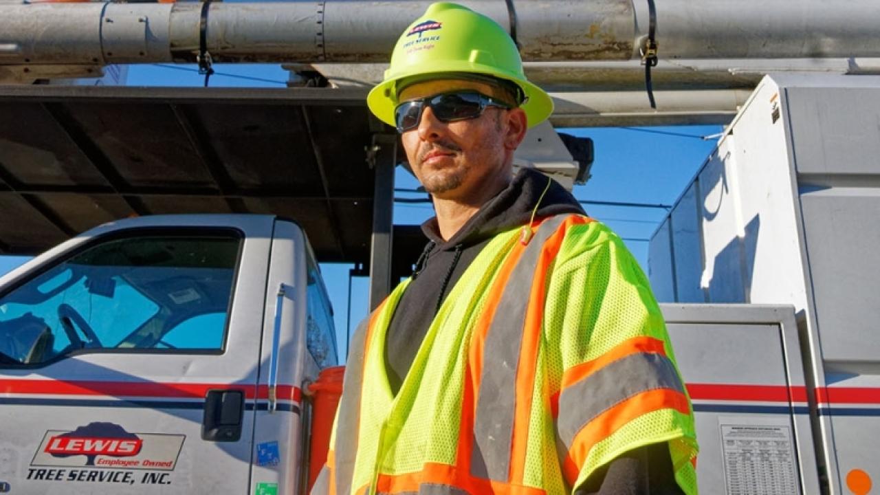 Joey Hunt in hard hat and yellow vest