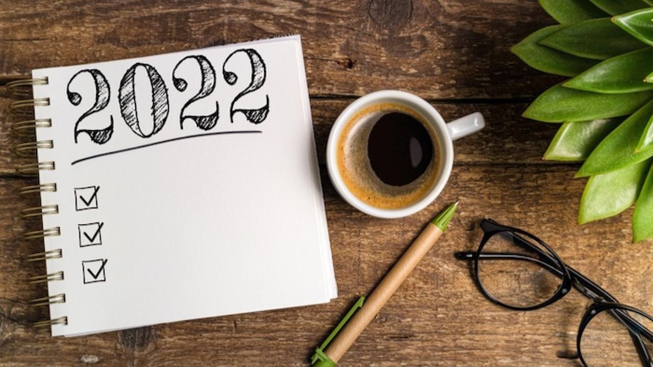 Image of a notebook with 2022 written on a page.