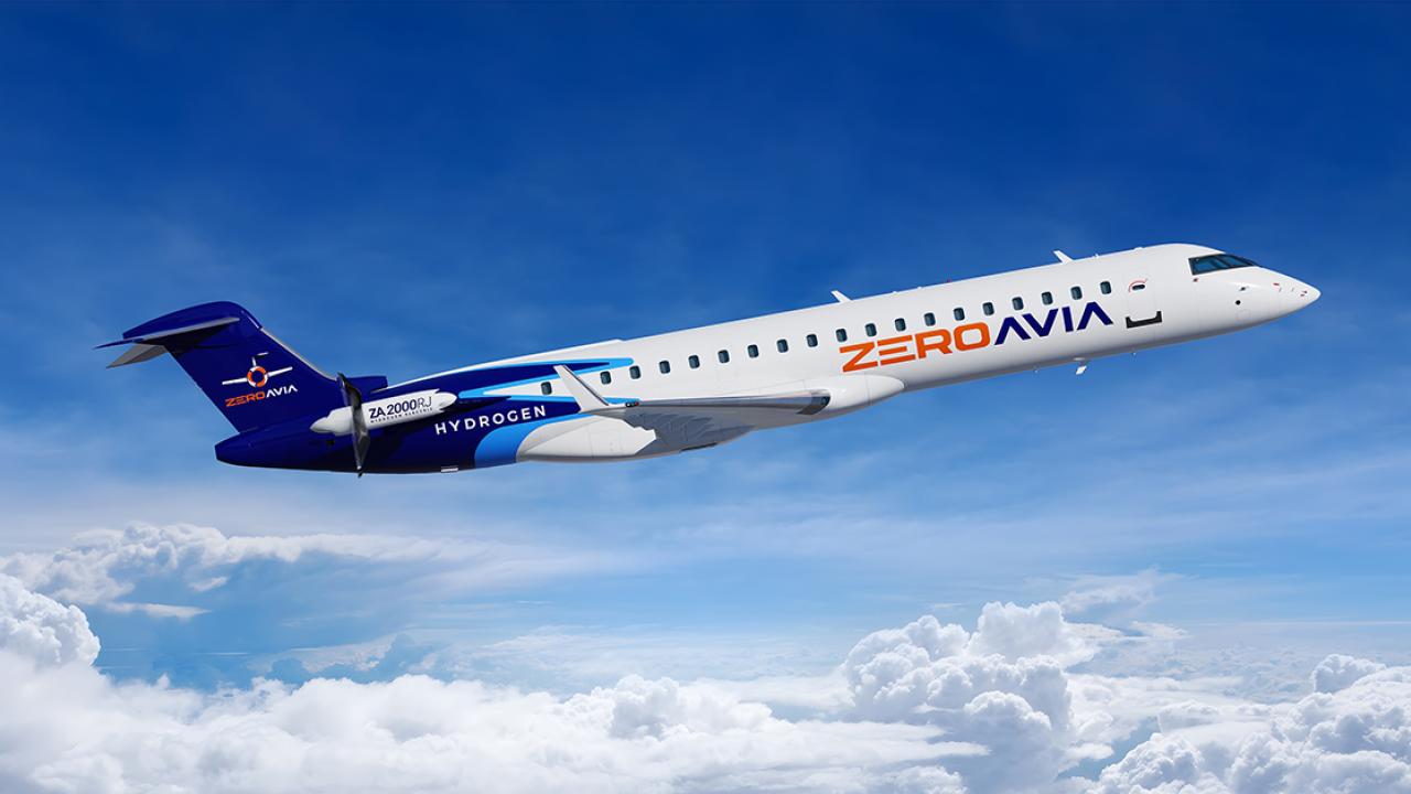 an airplane flying above the clouds. "ZeroAvia" on the side