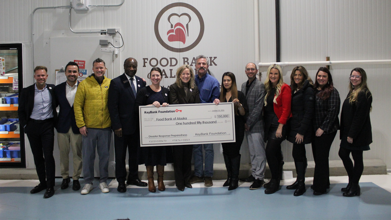 KeyBank and Alaska Food Bank Team members shown with a $150,000 grant check.