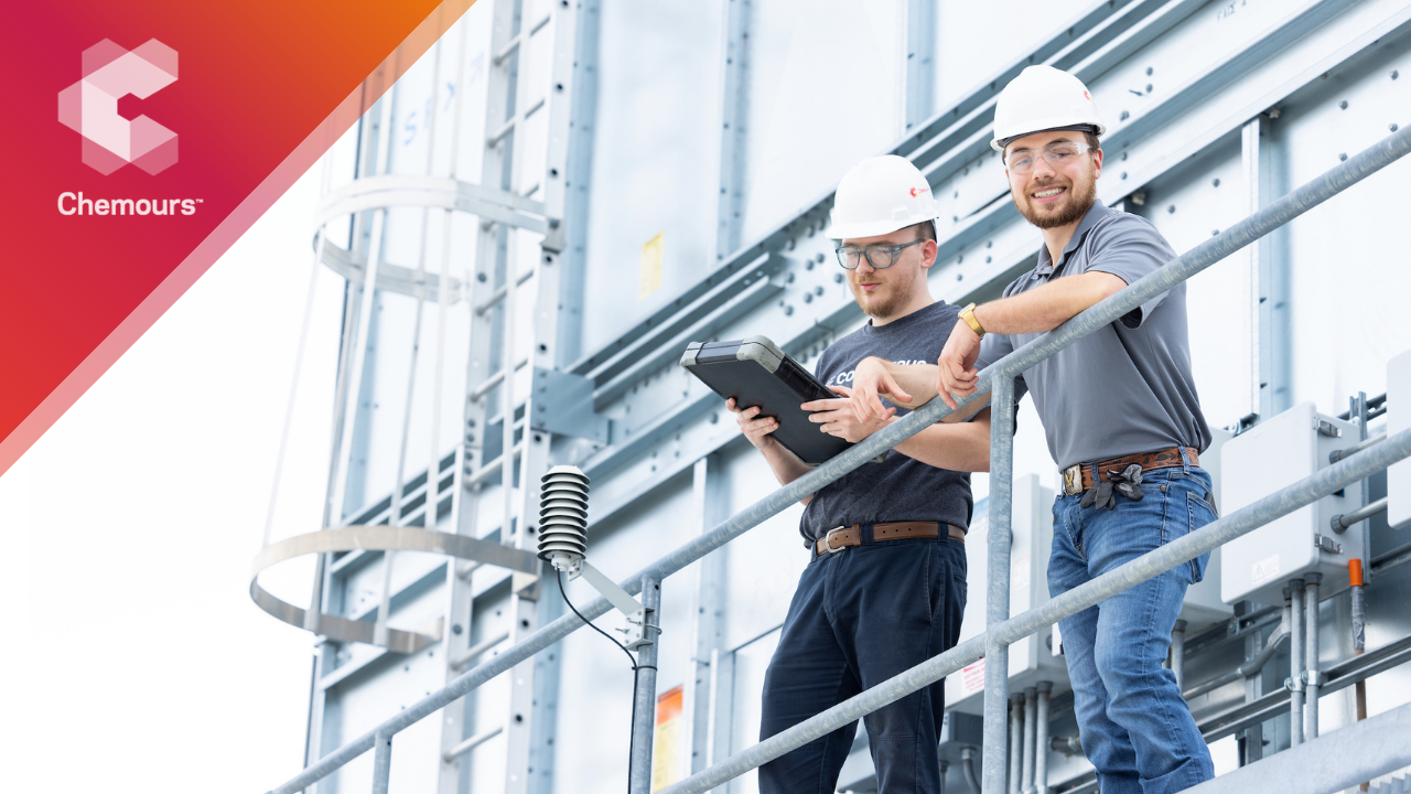 two people at a worksite together