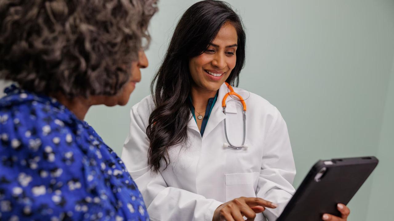 healthcare provider speaking to patient