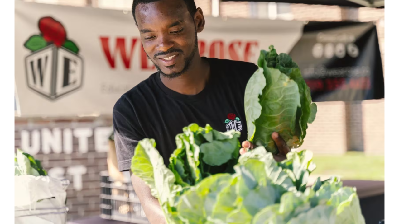 DaQuan Campbell holding cabbages