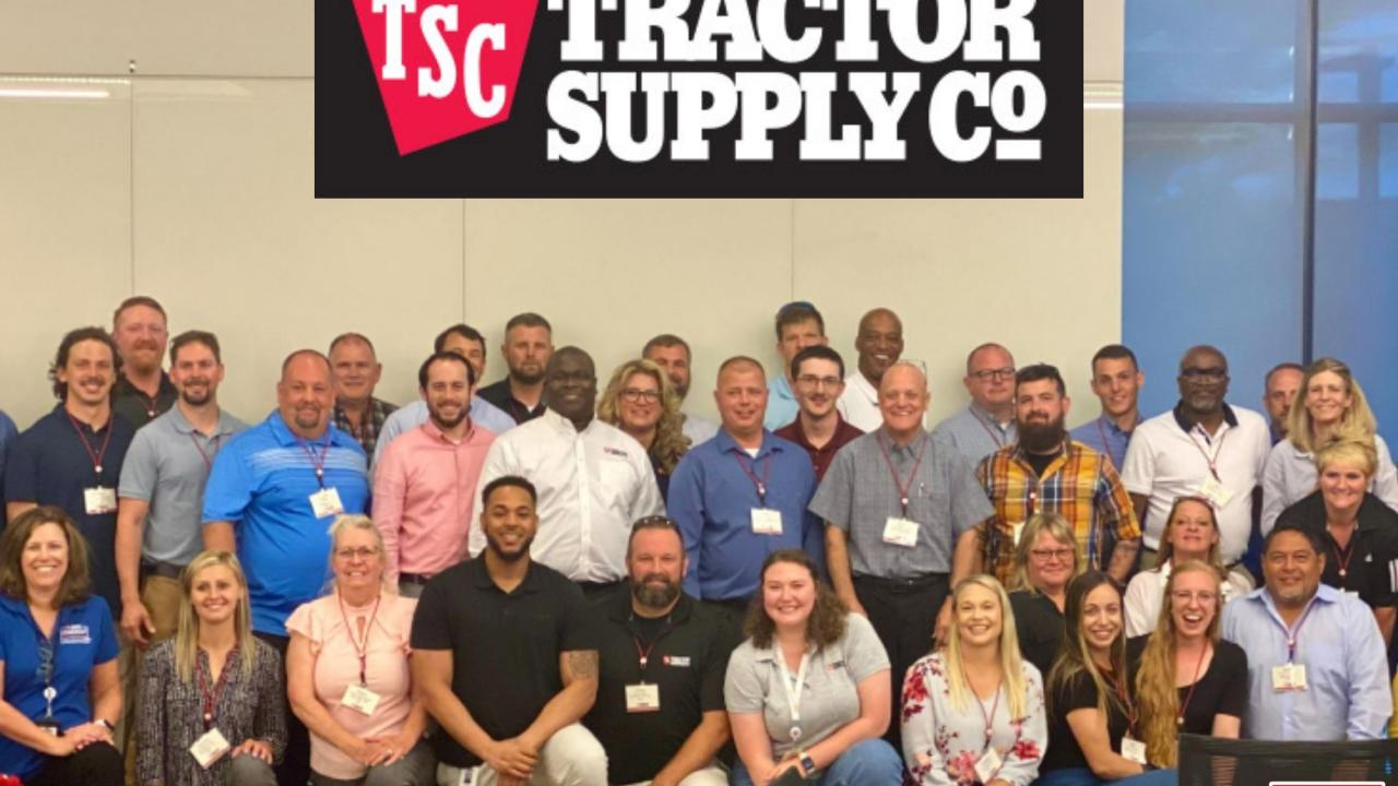 Tractor Supply employees pose for a picture